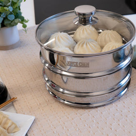 Joyce Chen steamer in pan setup for multi-dish meal prep.