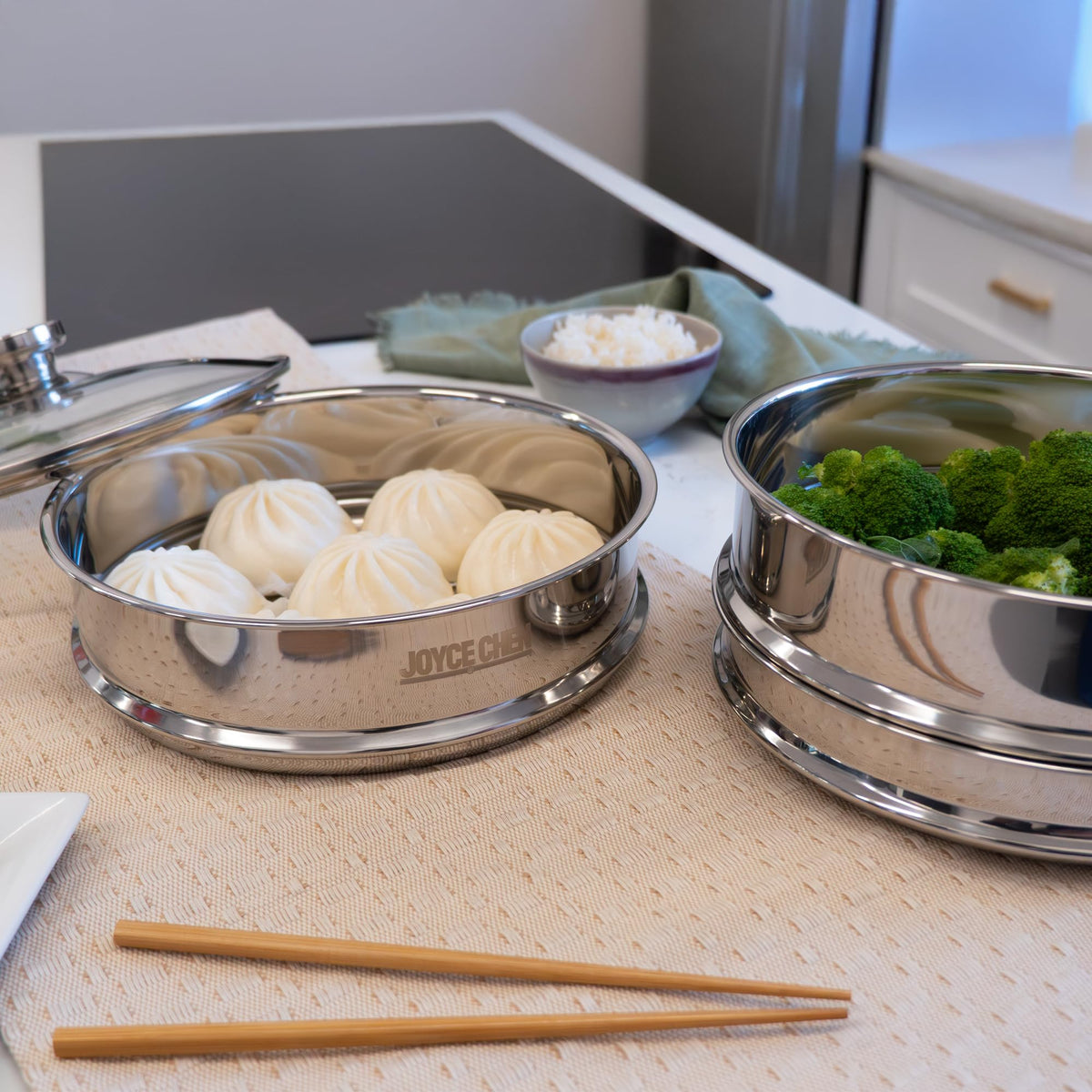Joyce Chen steamer with wok adapter ring elevates steam for even cooking.