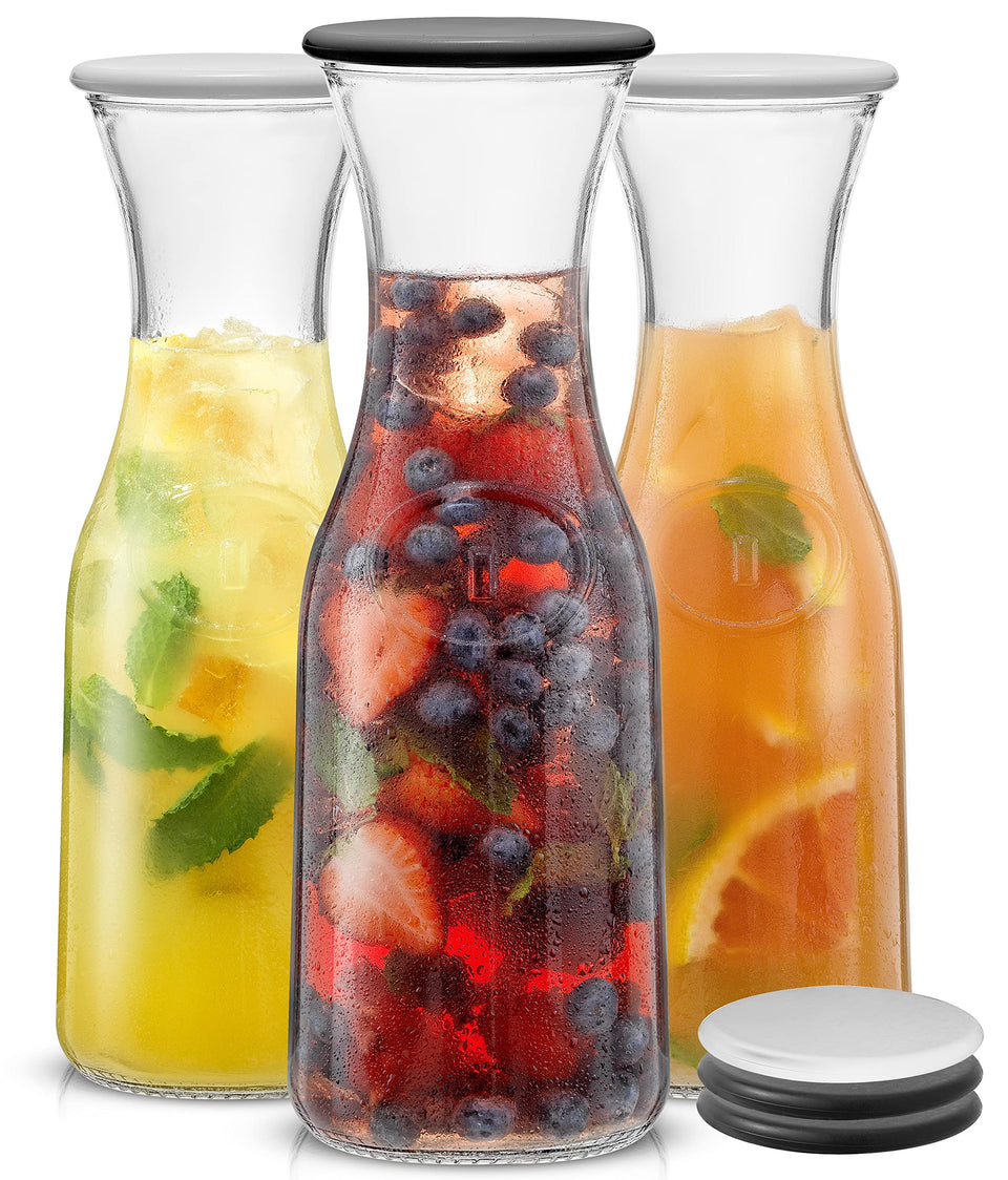 JoyJolt glass carafe with lids and packaging highlights durable build for easy hosting