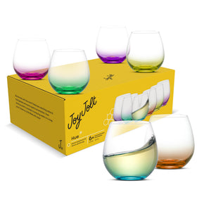 JoyJolt Hue dinner party glasses on table during a casual gathering.