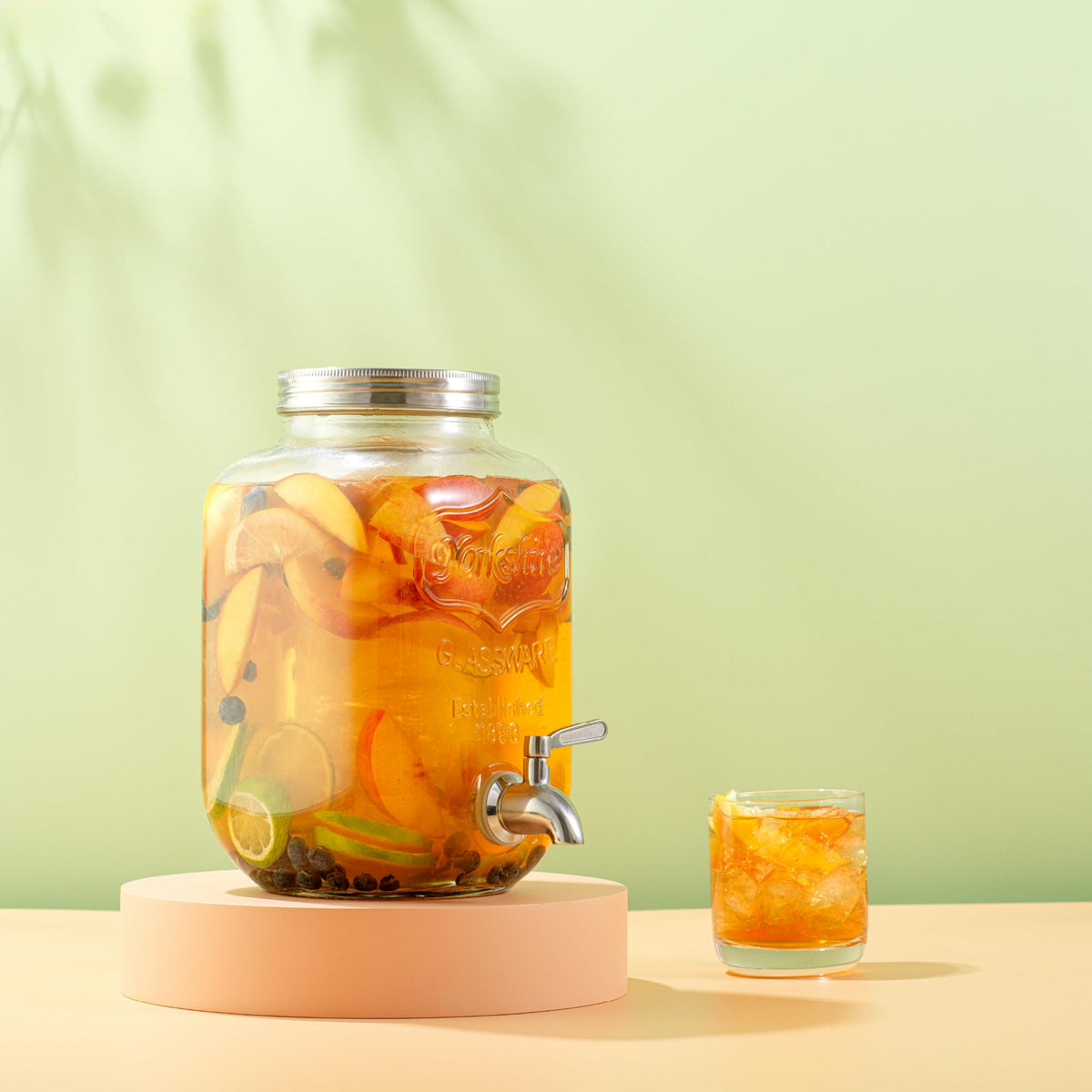 JoyJolt sangria dispenser ready for party-ready fruit-infused beverages.