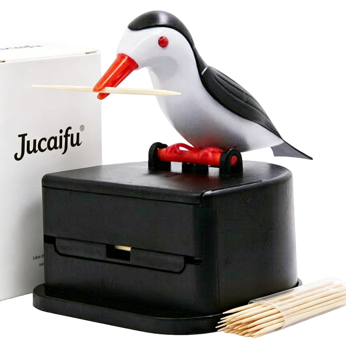 Jucaifu little bird toothpick dispenser on a dining table adds charm and quick access.