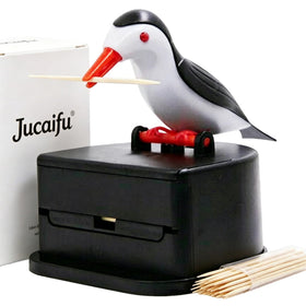 Jucaifu little bird toothpick dispenser on a dining table adds charm and quick access.