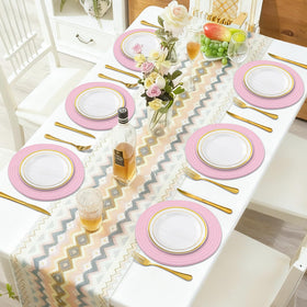 Jukercici round pink placemats in use at dining table, decorative and protective.