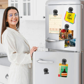 Junarter magnetic clip secures photos and calendars on fridge or whiteboard