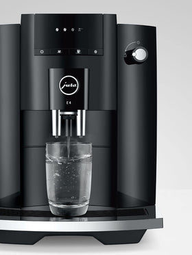 Jura E4 conical burr grinder emphasizing consistent grind quality and aroma.