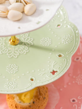 Jusalpha ceramic serving stand with gold accents for elegant table decor.