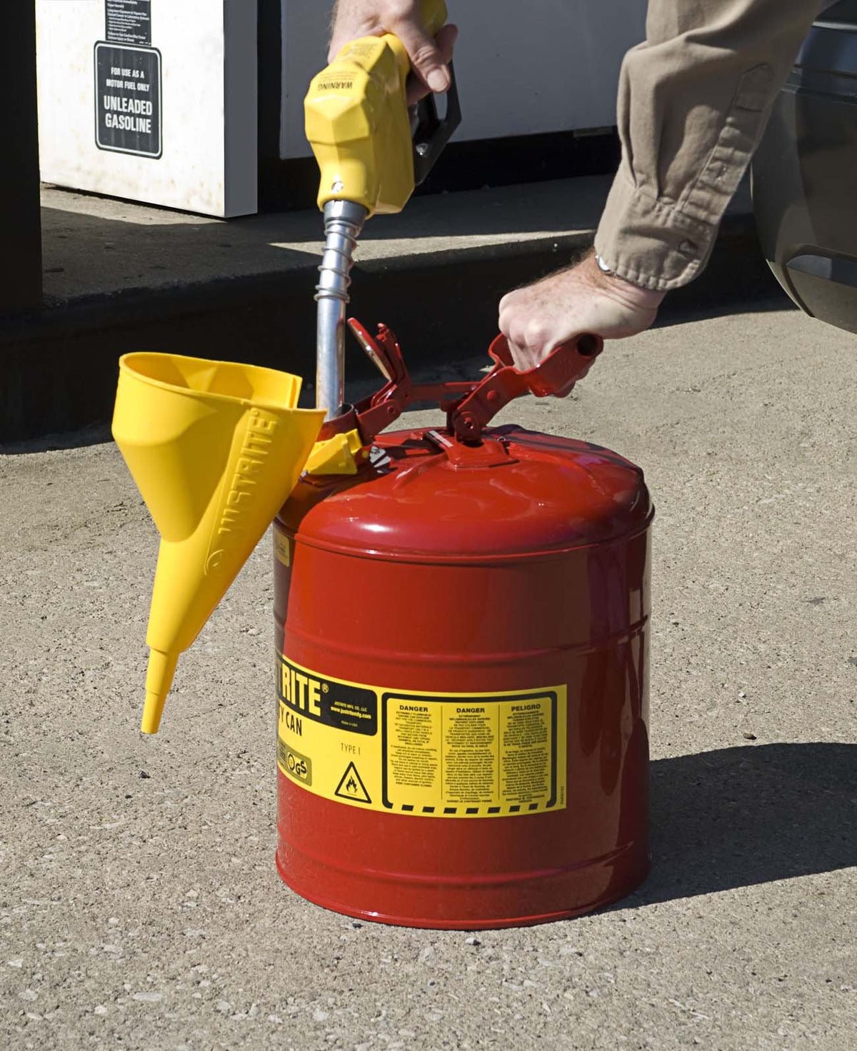 Justrite yellow polypropylene funnel, ideal for safe storage and quick transfers.