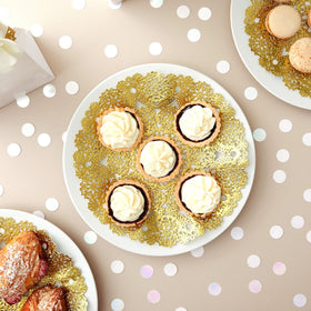 Juvale gold doilies with scalloped edges for upscale table décor.