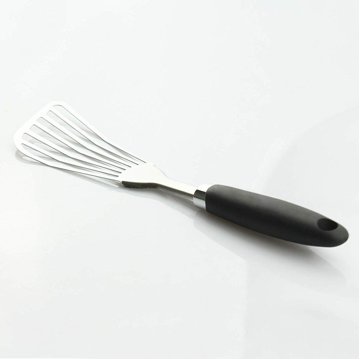 JXWING slotted spatula with ergonomic handle for precise turning.