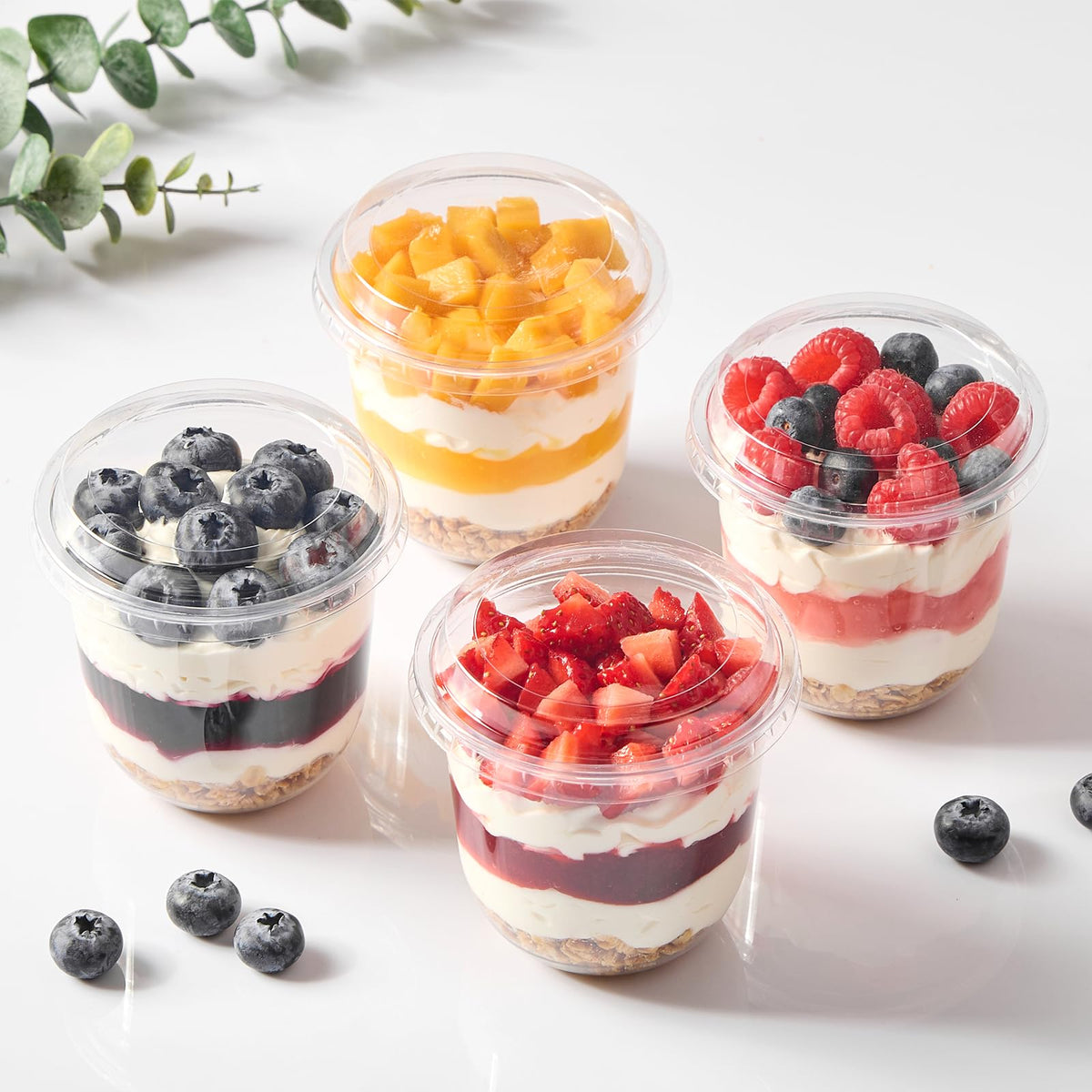 Jycnolm parfait cups with lids ideal for layered desserts.