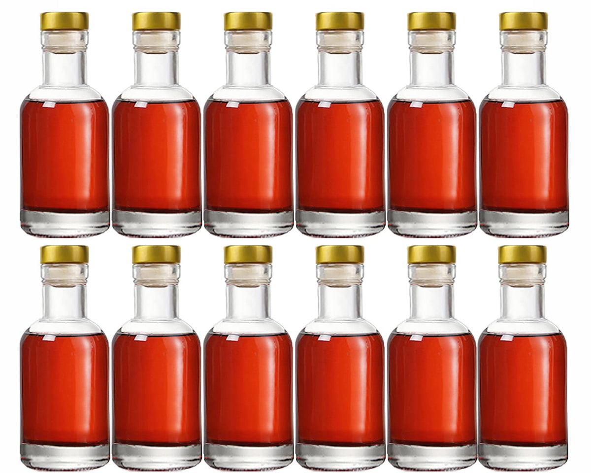 Kaachli clear glass bottle 3oz with cork ideal for wine and oil samples.