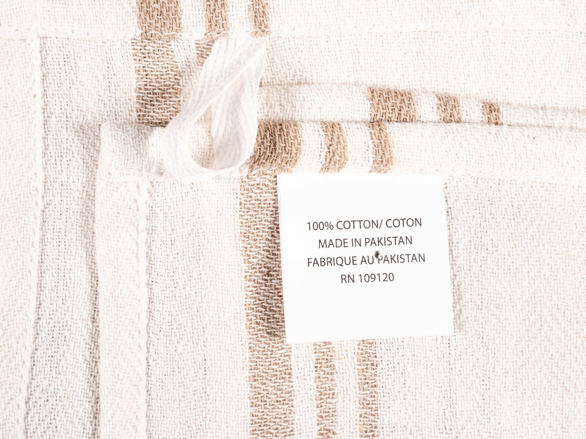 KAF Home beige flat kitchen towels wiping spills on counters.