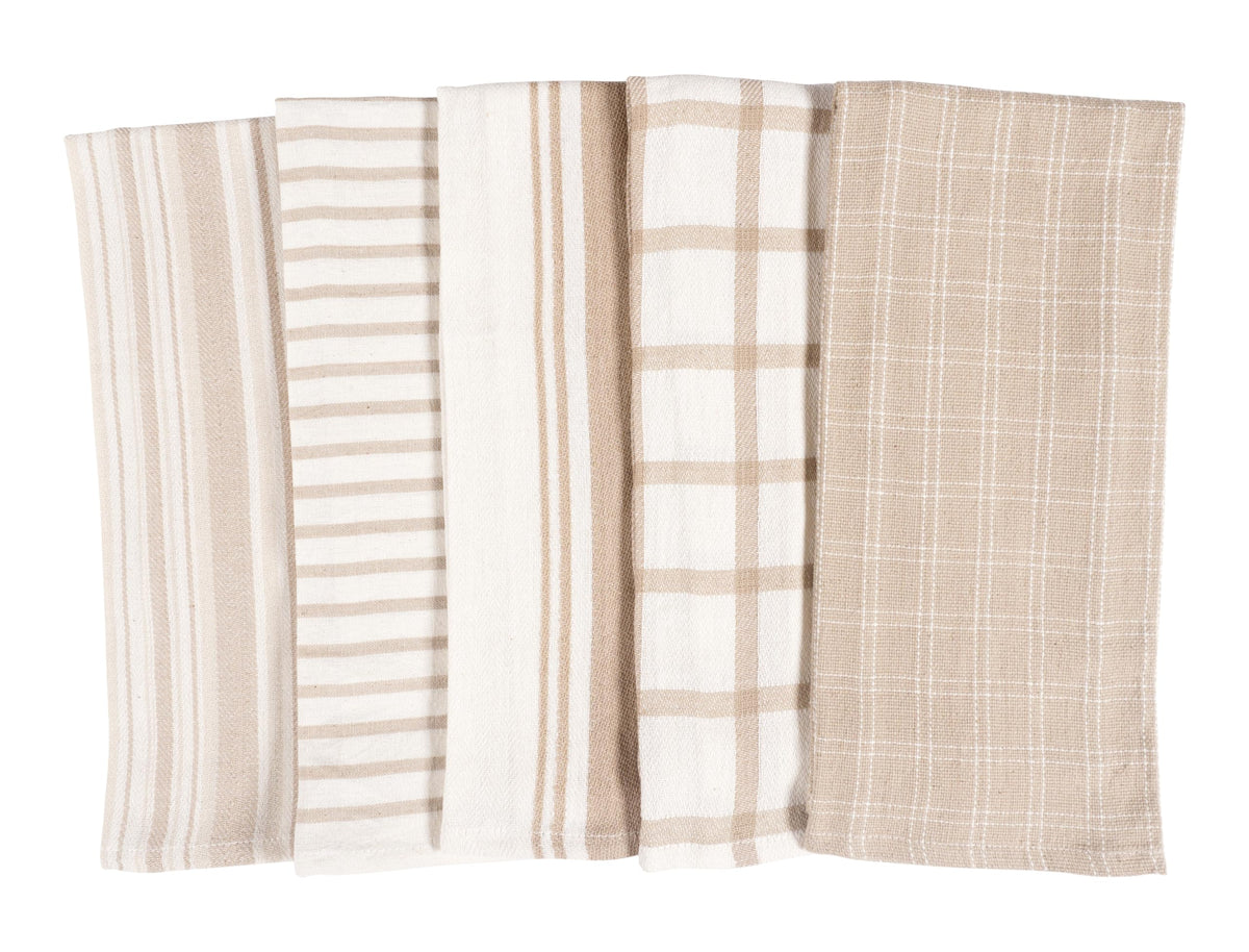 KAF Home beige flat kitchen towels stacked for dish drying.