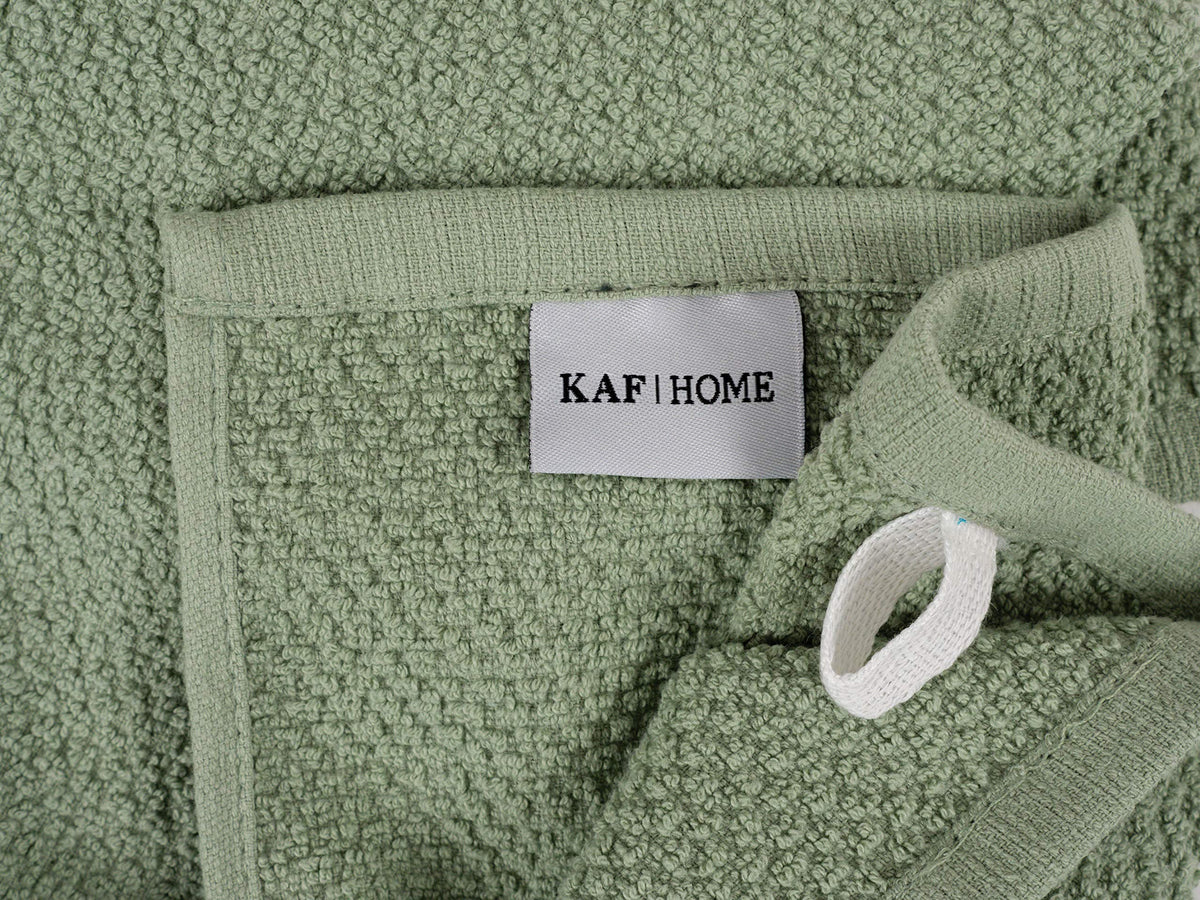 KAF Home Deluxe Popcorn Terry towel in use for drying hands and dishes