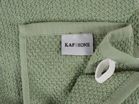 KAF Home Deluxe Popcorn Terry towel in use for drying hands and dishes