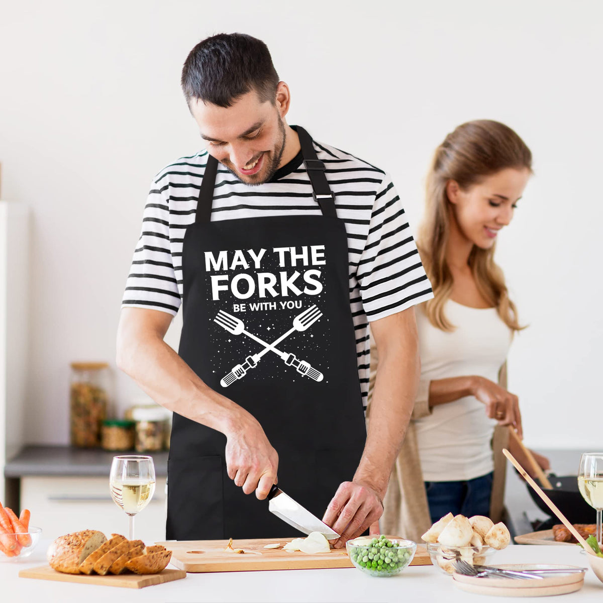 Kaidouma man grilling in apron demonstrates full coverage and practicality