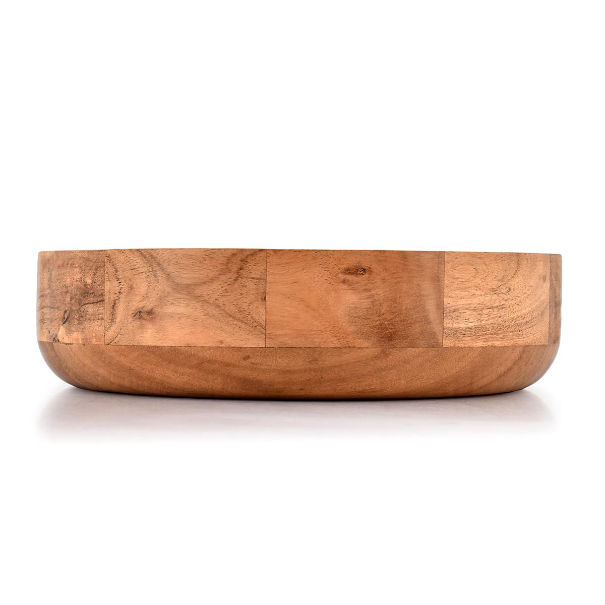 Kaizen Casa wooden round bowl used as an elegant dessert platter for sweets.