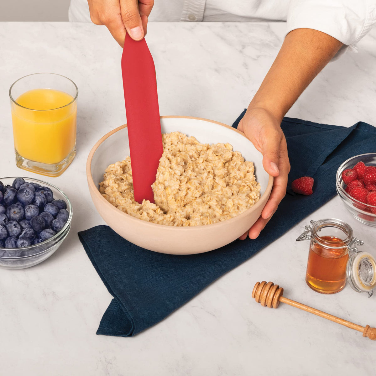 Kalorik spurtle 10.5in slotted for draining liquids while mixing sauces.