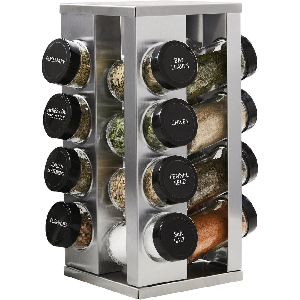 Kamenstein Heritage 16-jar spice rack on a counter with jars and labels for quick access.