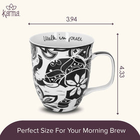 Rim and print clarity on Karma mug, microwave-safe convenience.