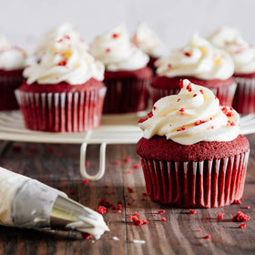 Kasmoire drop flower tip designs delicate flower accents with icing.