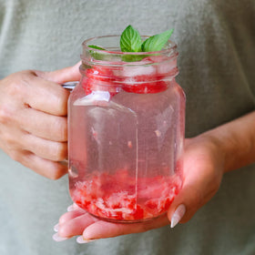 Kate Aspen mason jar mug with handle closeup, comfortable grip for iced coffee or cocktails.