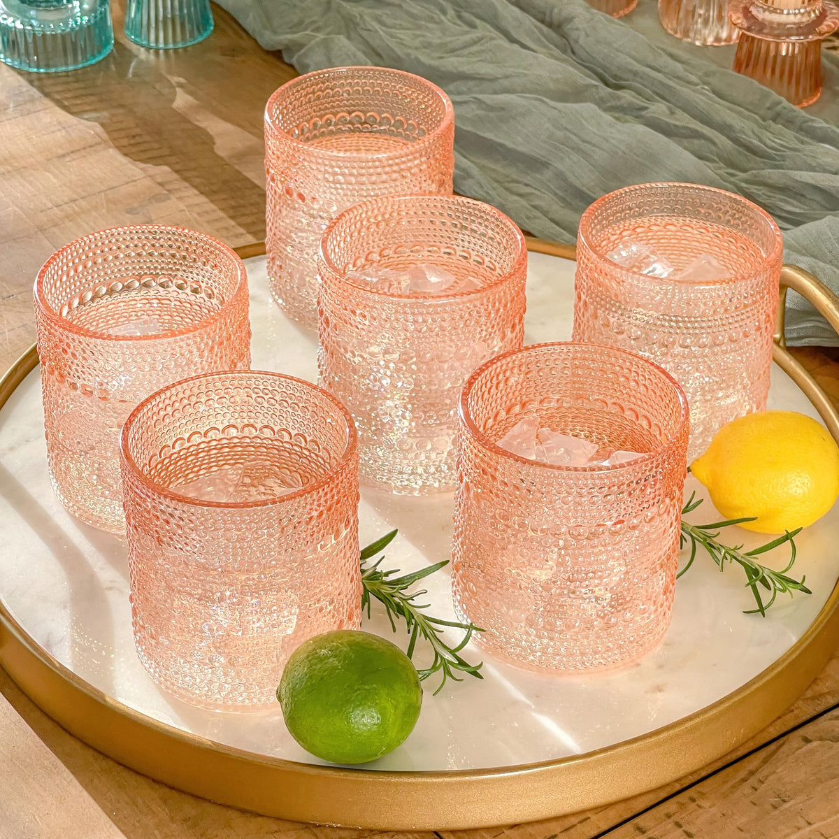 Kate Aspen rose gold hobnail cup on bar cart adds chic display