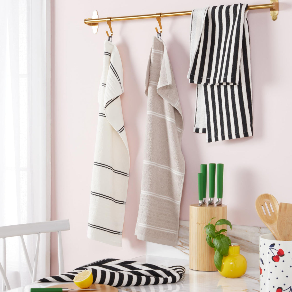 kate spade new york towel soaking liquids on counter