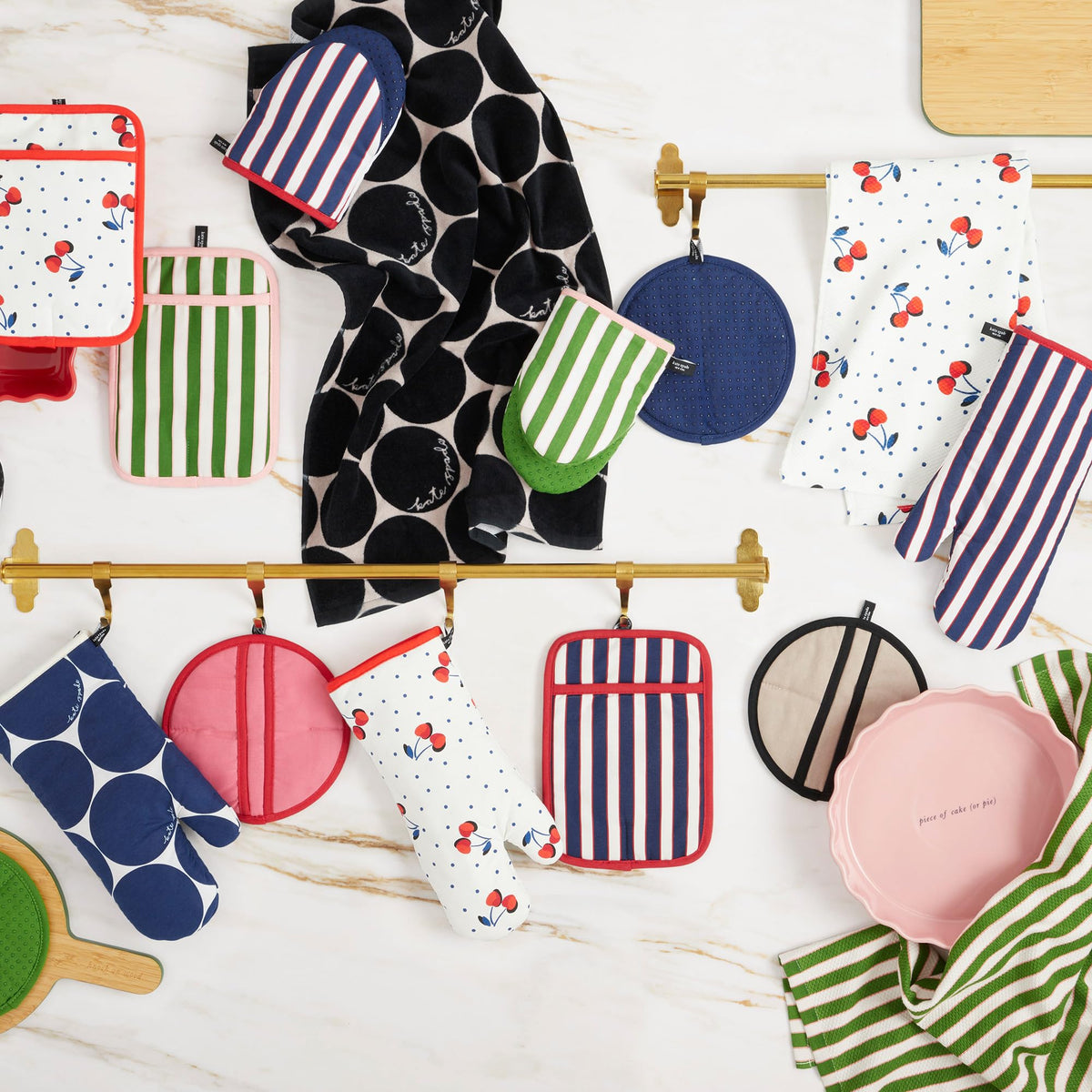 kate spade new york two-pack oven mitts with loop for easy hanging storage.