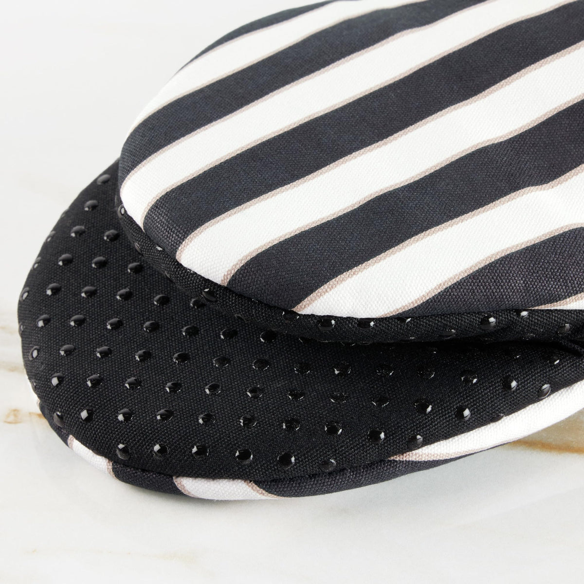 kate spade new york botanical stripe mitts feature quilted lining for cushioned protection.