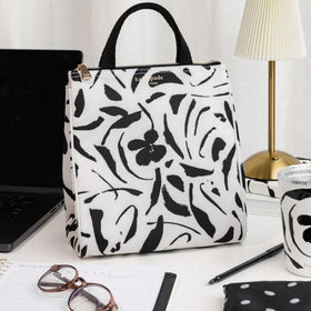 kate spade new york easy-clean interior keeps spills easy to wipe away