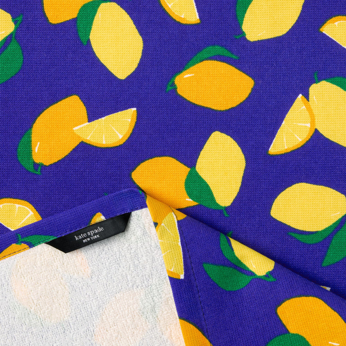 kate spade new york lemon party towels absorbent closeup; highly absorbent for quick liquid cleanup