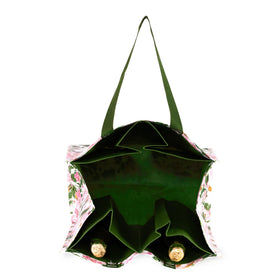 kate spade new york bag interior pockets keep bottles upright during trips.