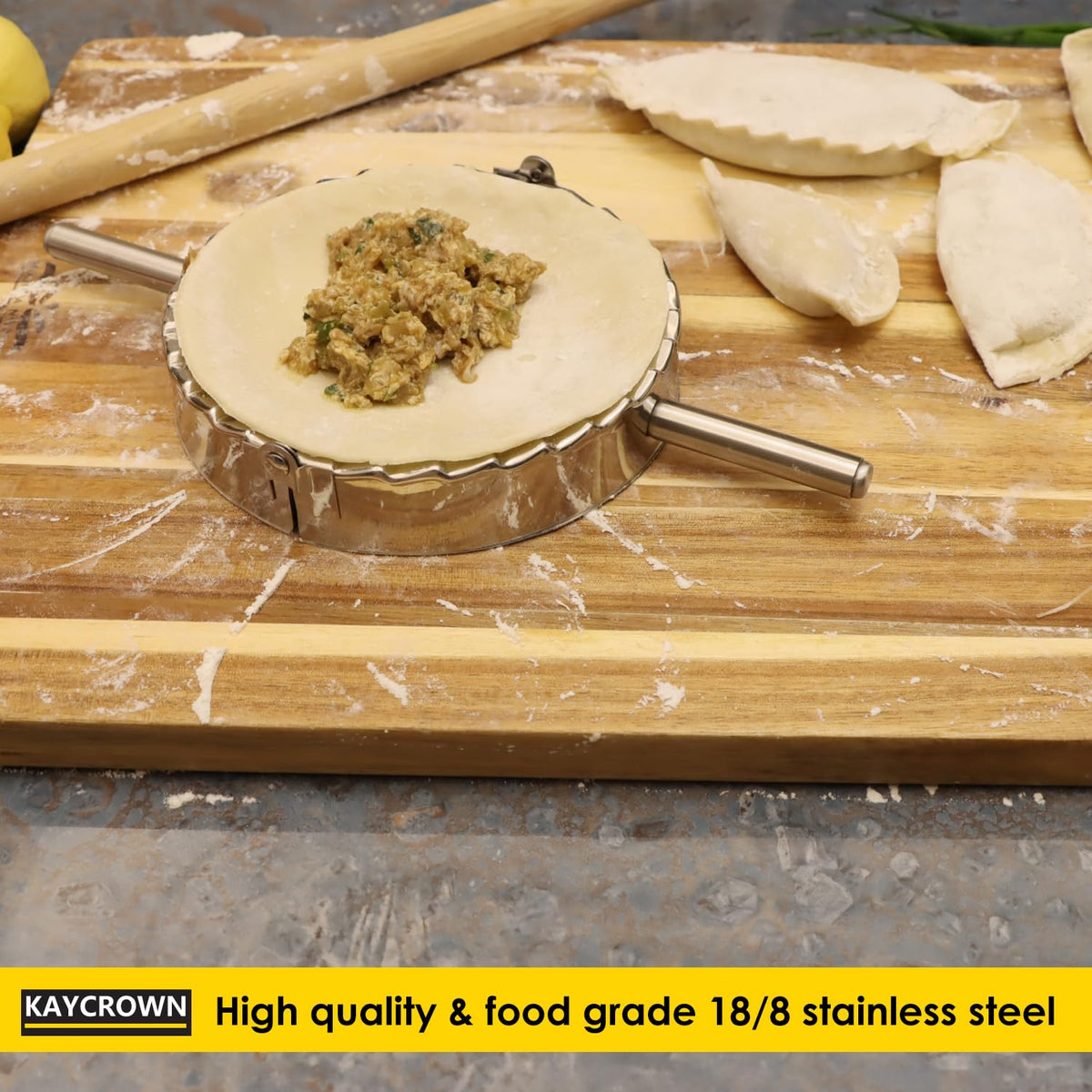 KAYCROWN empanada press with easy-grip handles for comfortable use.