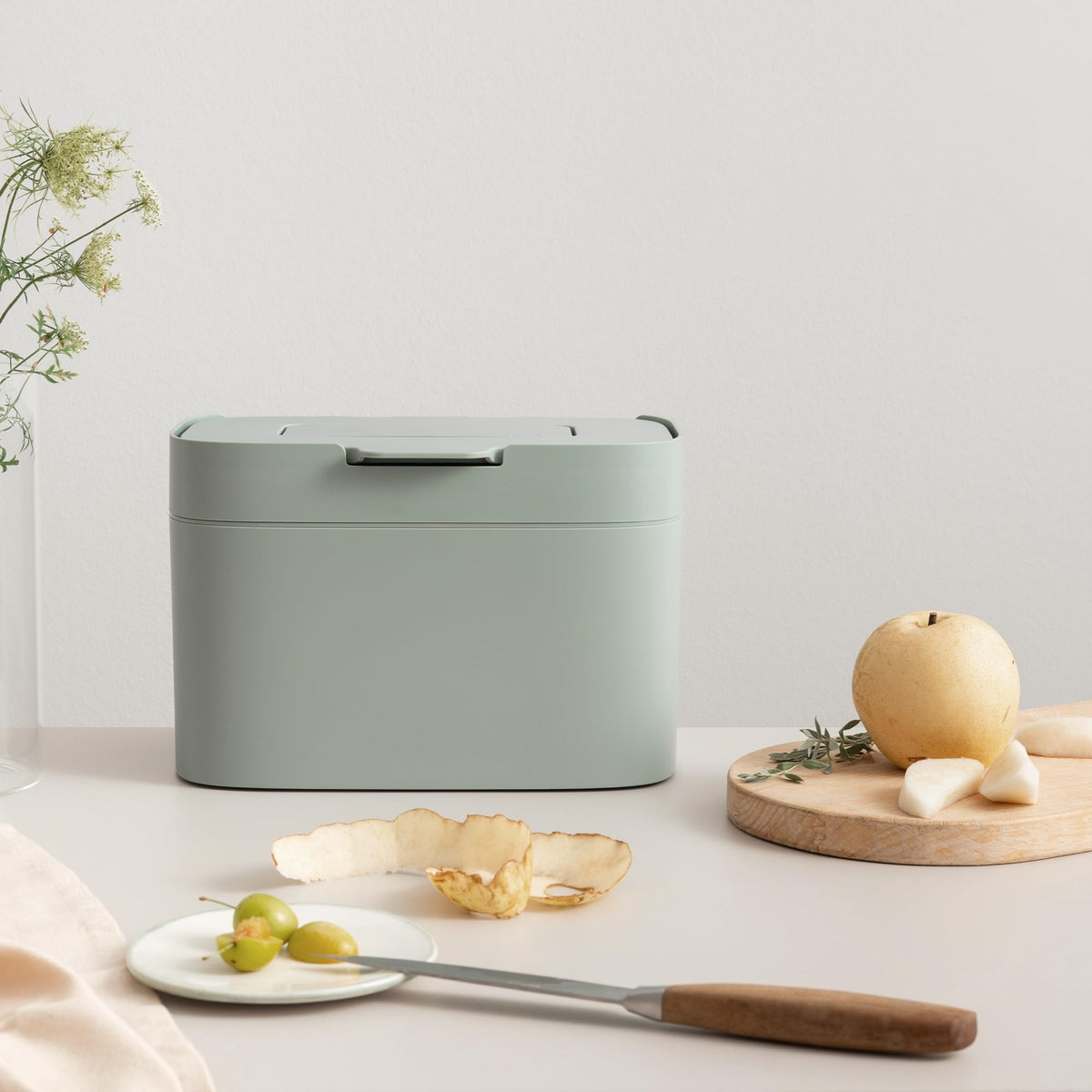 Sage-green finish on Kazai Elin adds calm style to a modern kitchen.