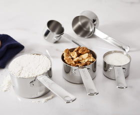 KEAWELL dishwasher-safe stainless steel measuring cups for easy cleanup.