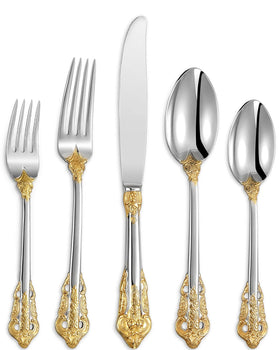 KEAWELL luxury flatware on table with gold accents for elegant dining.