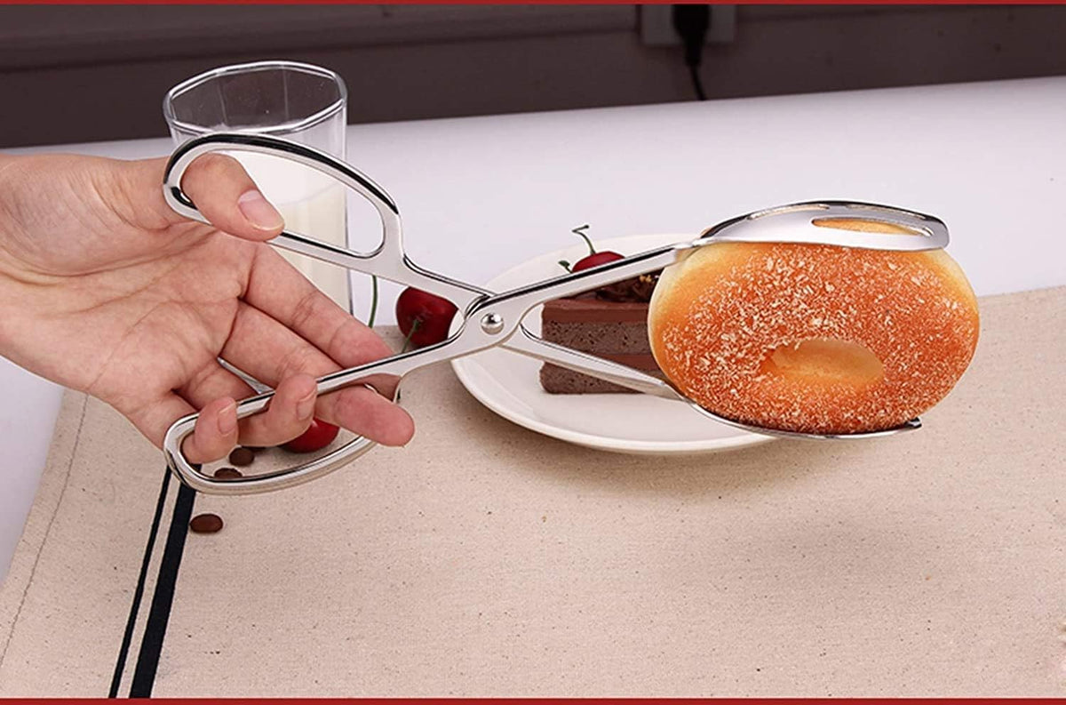 KEBE 2-Pack serving tongs gripping bread, ideal for buffet service.