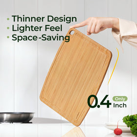 Keechee dual-sided cutting board in use for prep and serving.