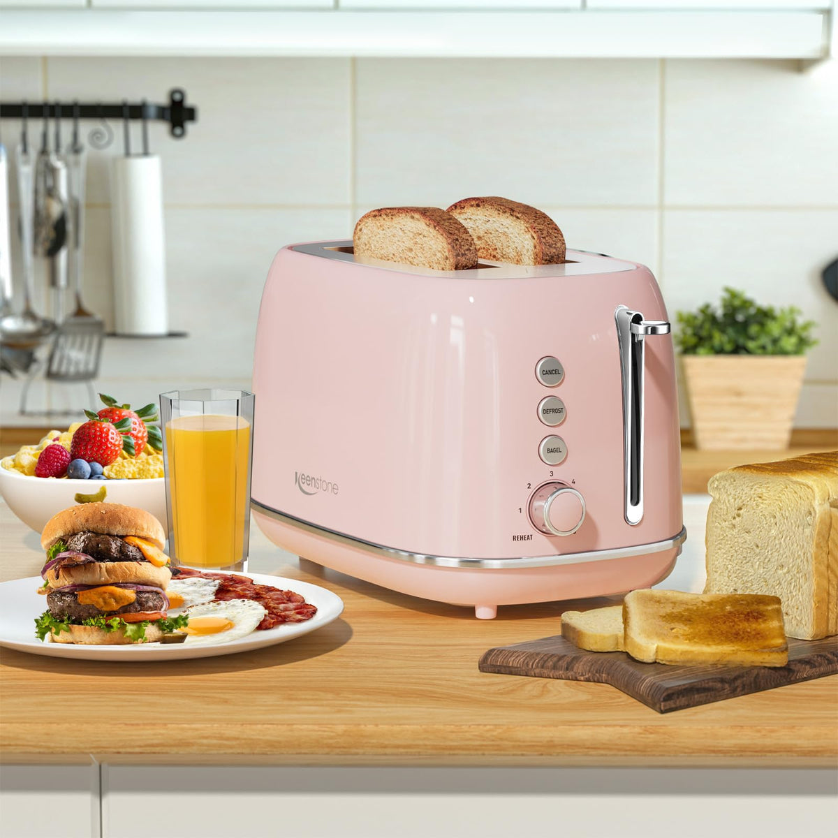 Keenstone toaster with removable crumb tray for easy cleanup.