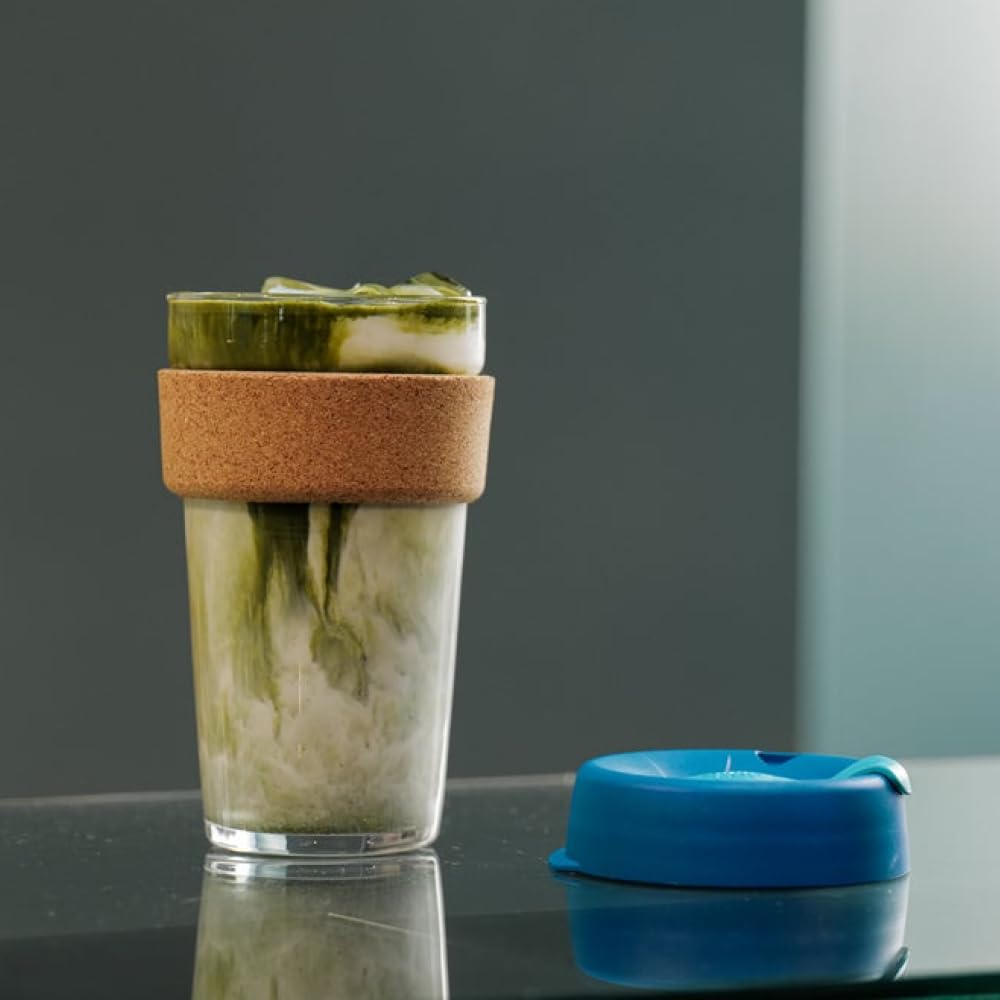 KeepCup Brew Cork lid close-up highlights splash-free drinking on the go.