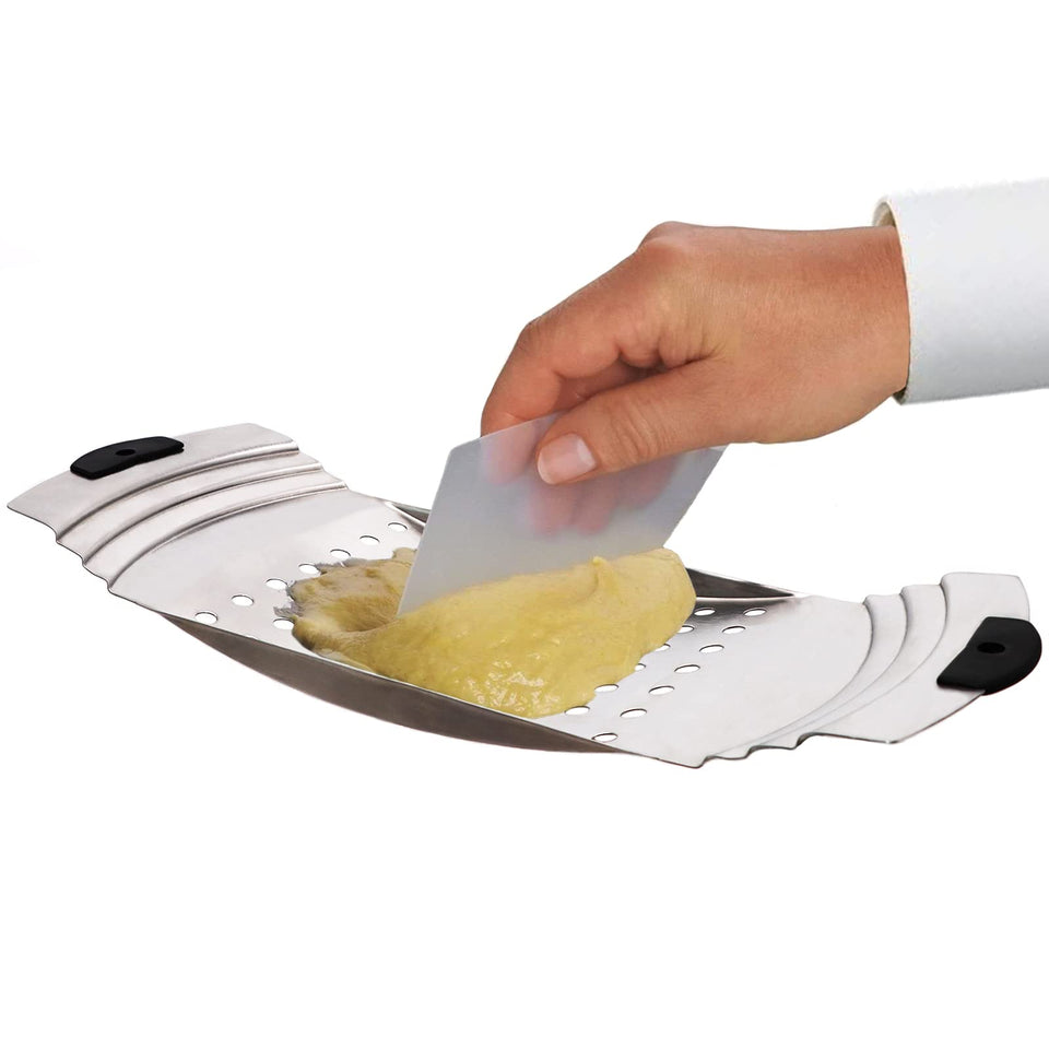 Keissco spaetzle maker plane over pot shows quick, uniform noodles.