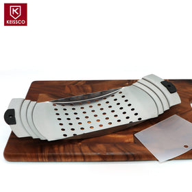 Keissco spaetzle maker scraper in action presses dough smoothly for even results.