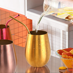 Close-up of Keiwhsly gold rimmed stemless tumbler for smooth sipping.