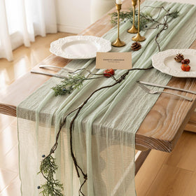 Keketoarrange sage green cheesecloth runner close-up shows stitched edges for durability
