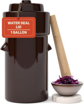 Kenley fermentation crock with lid on maintains proper gas release and flavor.