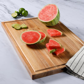 Kenmore Kenosha serving-ready cutting board used for meats and cheeses at gatherings