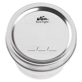 Kerr wide-mouth half-pint jar clear glass texture enhances visibility of contents.