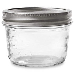 Kerr wide-mouth half-pint jar detail highlights sturdy glass and smooth rim.